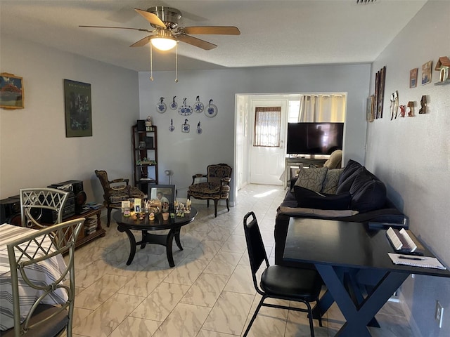 living room with ceiling fan