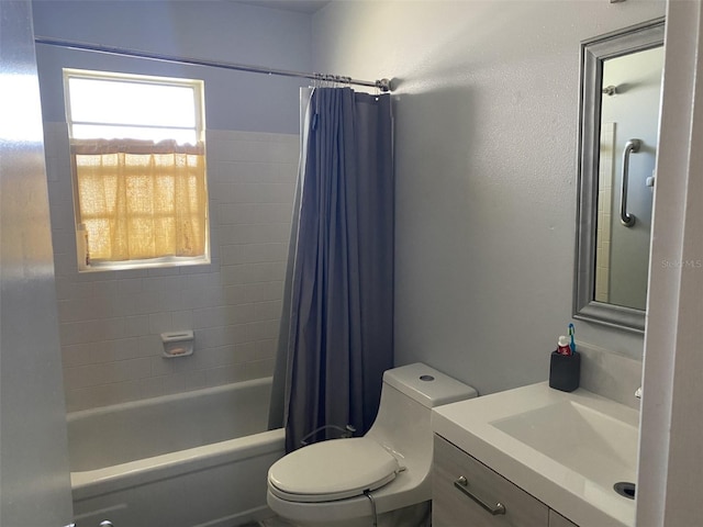 full bathroom with toilet, vanity, and shower / bathtub combination with curtain