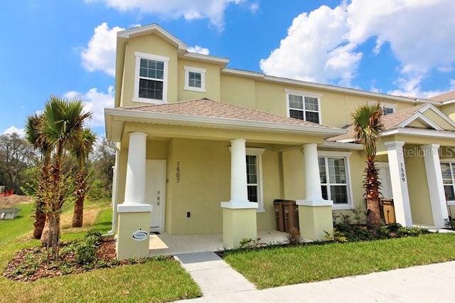 view of front of property with a front lawn