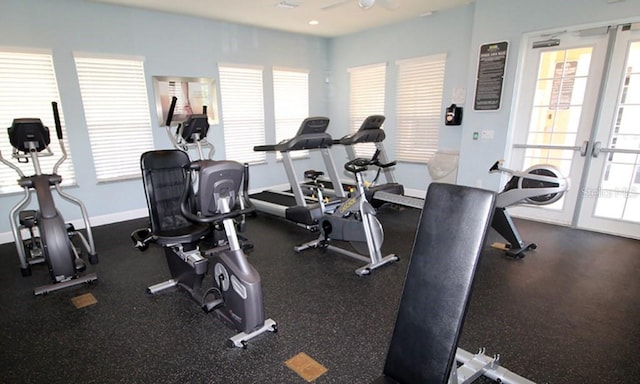 workout area with french doors, baseboards, and a ceiling fan