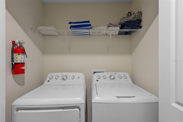 laundry area featuring washer and clothes dryer