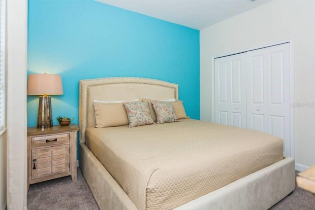 carpeted bedroom with a closet