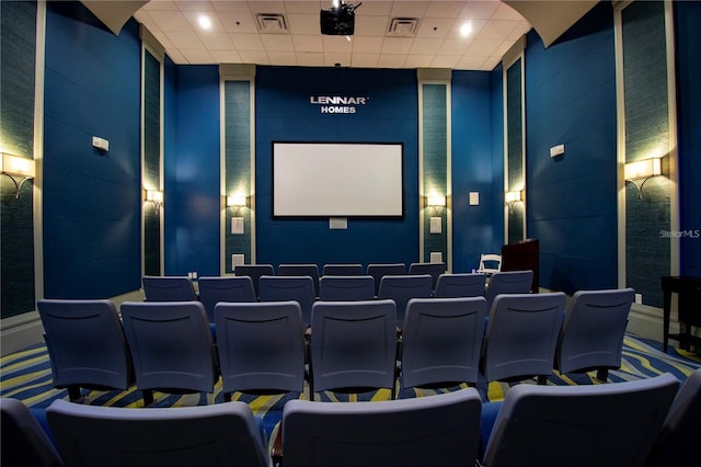 cinema room with a drop ceiling