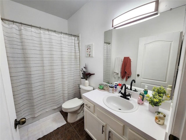 full bathroom with tile patterned flooring, curtained shower, vanity, and toilet