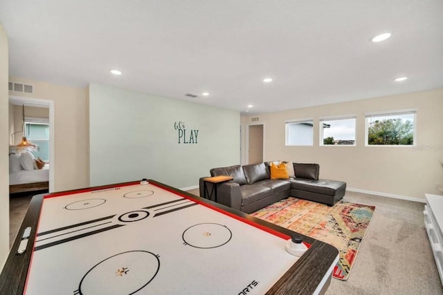 game room with light carpet