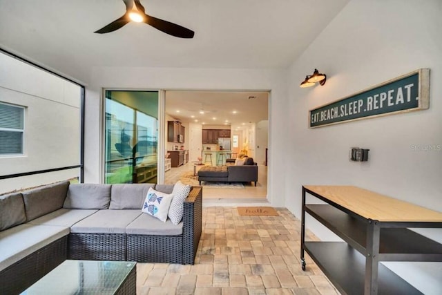 interior space with ceiling fan and light wood-type flooring