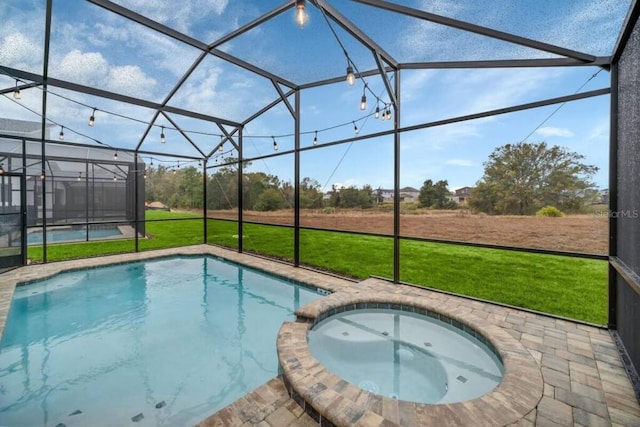 view of pool with a patio area, a lanai, and a yard