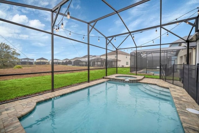 view of swimming pool featuring a yard, an in ground hot tub, and glass enclosure