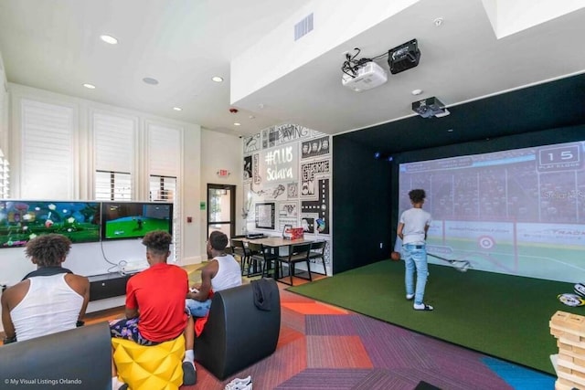 recreation room with golf simulator