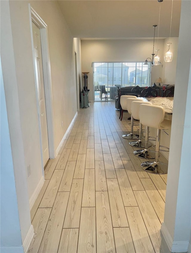 hallway featuring light hardwood / wood-style flooring