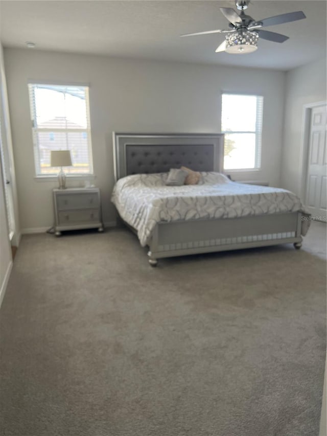 bedroom featuring carpet floors and ceiling fan