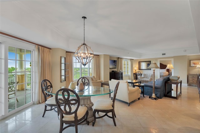 tiled dining space with an inviting chandelier