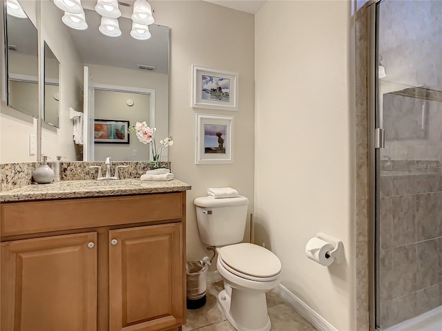 bathroom with an enclosed shower, tile flooring, large vanity, and toilet