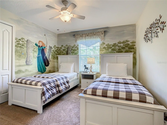 carpeted bedroom with ceiling fan