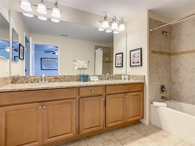 bathroom featuring shower / tub combo, tile floors, ceiling fan, and dual vanity