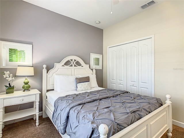 carpeted bedroom with a closet