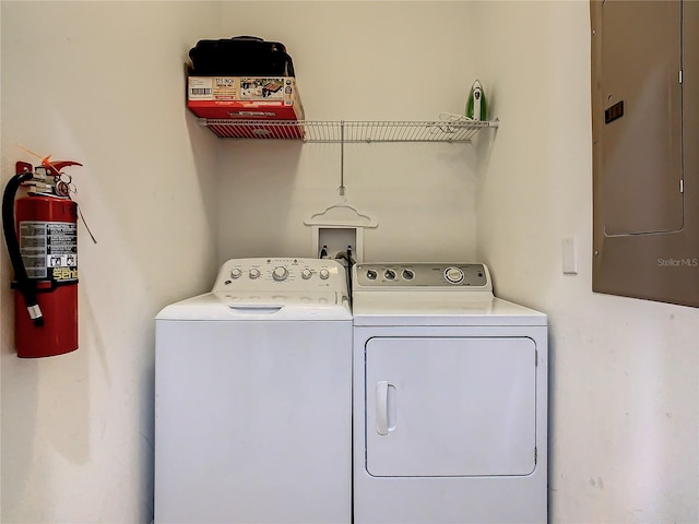 laundry area with hookup for a washing machine and washing machine and clothes dryer