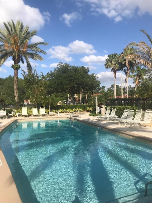 view of swimming pool with a patio