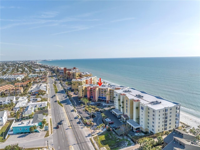 birds eye view of property with a view of city and a water view