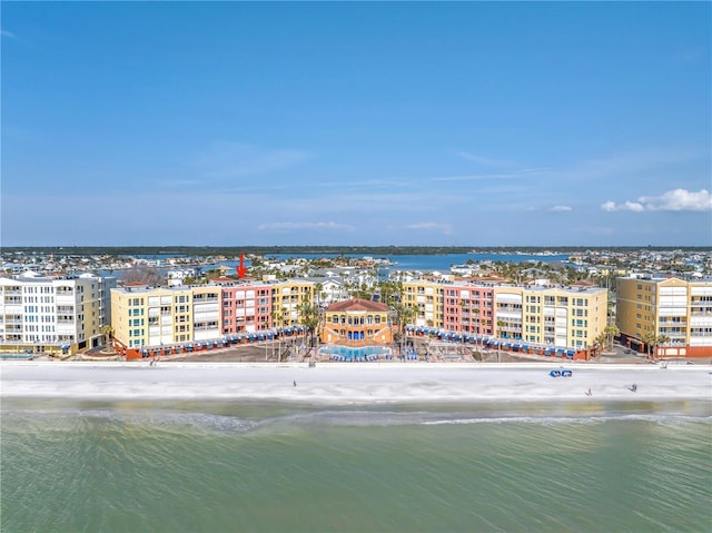 birds eye view of property featuring a water view and a city view