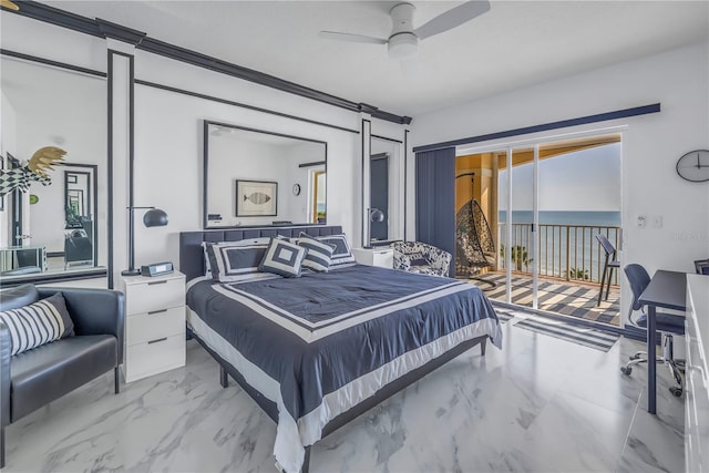 bedroom with a barn door, a ceiling fan, a water view, marble finish floor, and access to exterior