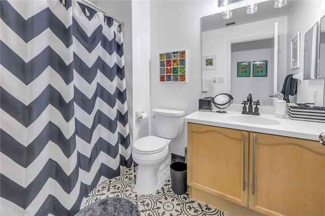 full bathroom with visible vents, toilet, tile patterned floors, curtained shower, and vanity