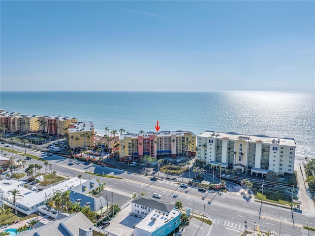 birds eye view of property featuring a view of city and a water view