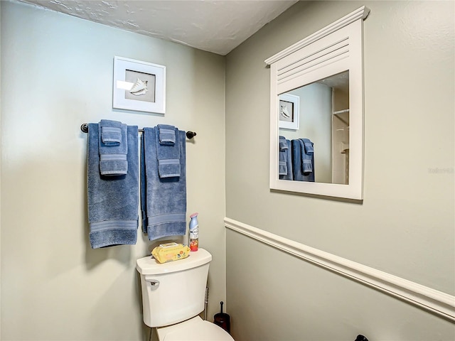 bathroom featuring toilet