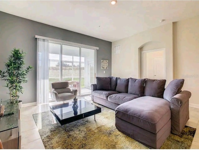 living room with light tile flooring