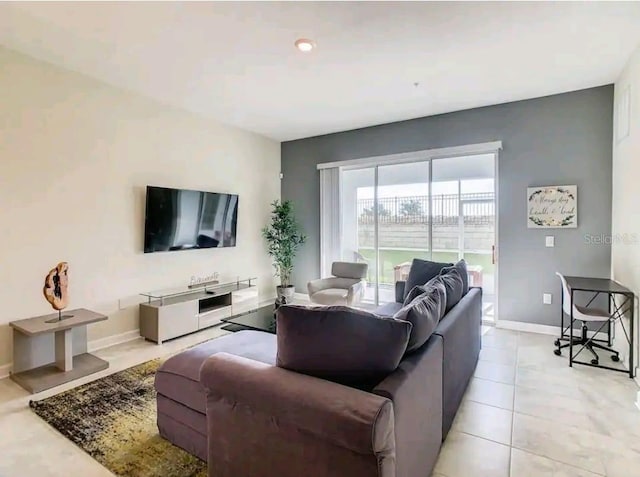 living room with light tile flooring