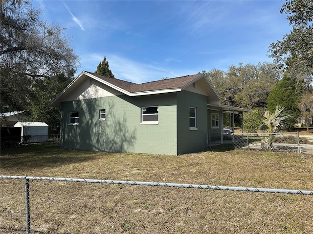 view of home's exterior featuring a yard