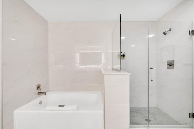 bathroom featuring a shower with shower door