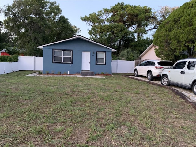 exterior space with a front lawn