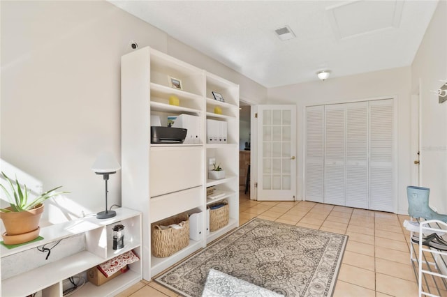 mudroom featuring light tile patterned flooring