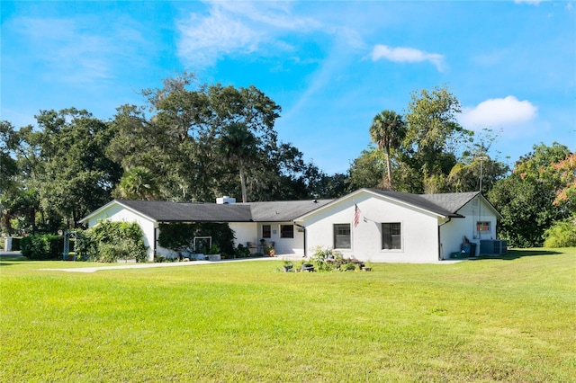 single story home featuring central AC unit and a front yard