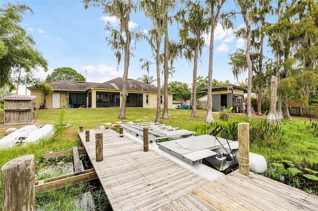 dock area featuring a yard