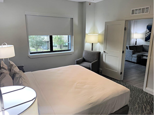 bedroom featuring wood-type flooring