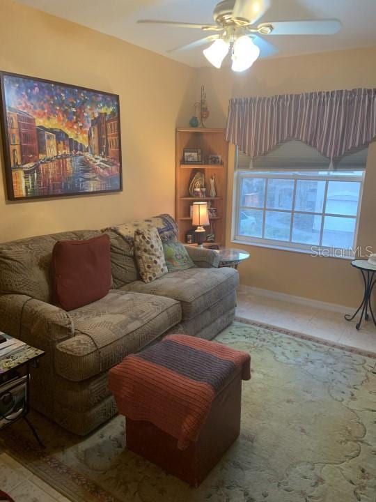 living room featuring ceiling fan