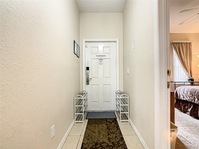 entryway featuring light tile floors