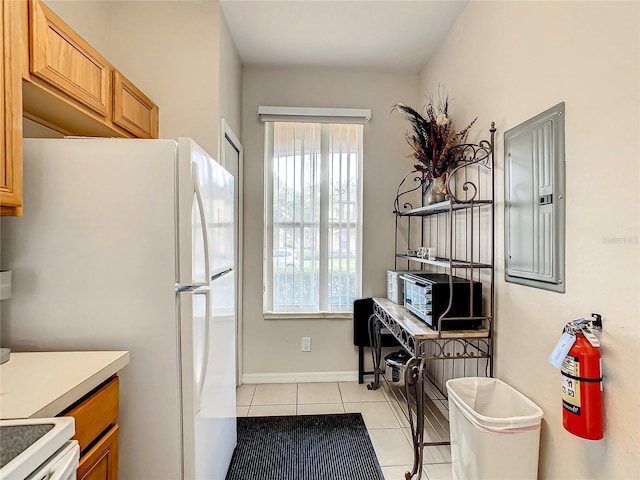 kitchen with light tile flooring