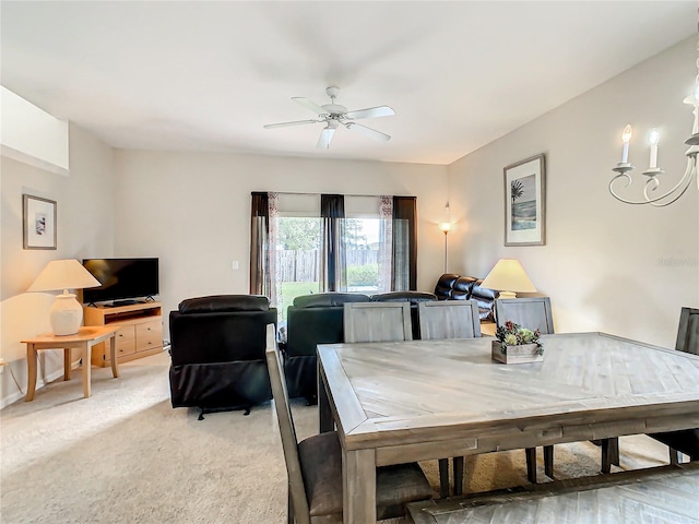 dining room featuring carpet floors and ceiling fan