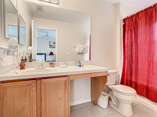 bathroom featuring toilet, tile flooring, ceiling fan, and vanity