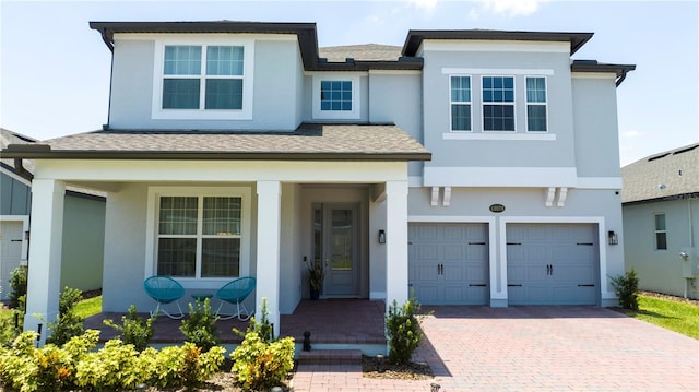 view of front of home with a garage