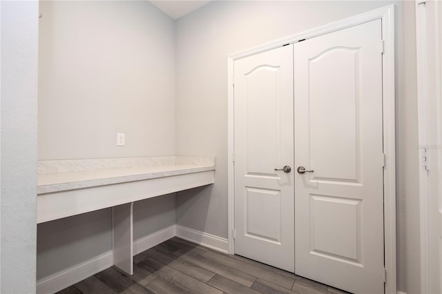 mudroom featuring dark wood-type flooring