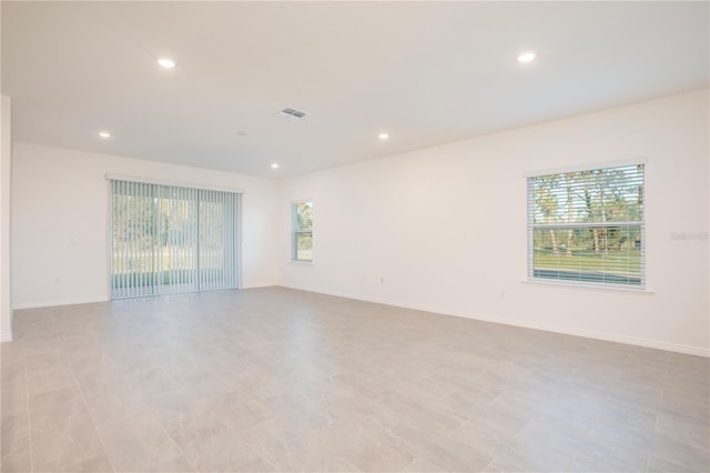 unfurnished room with a wealth of natural light