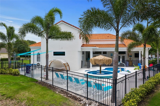 view of pool featuring a patio area and a community hot tub