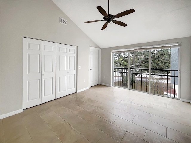 unfurnished bedroom with visible vents, high vaulted ceiling, a ceiling fan, access to outside, and baseboards