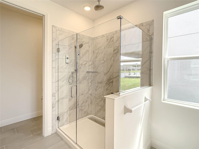 bathroom featuring an enclosed shower