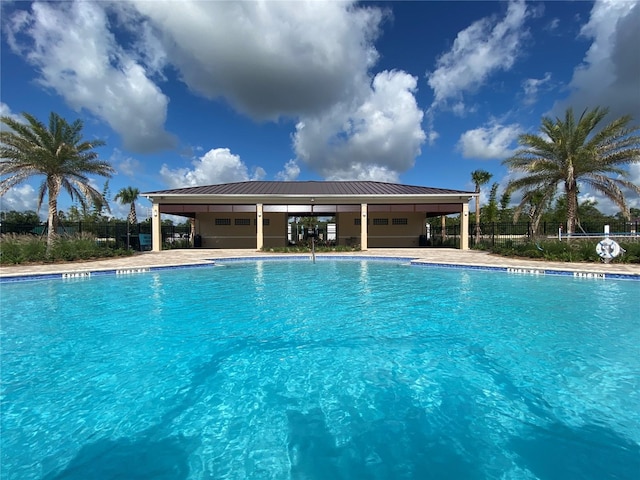 view of swimming pool featuring a patio