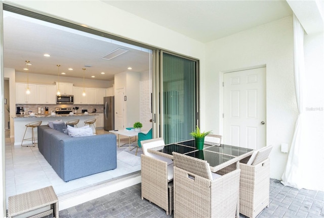 living room with light tile floors